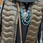 New Fall Arrival: Ladies black shirt with puffy vest, turquoise necklace, black hat and cross body tan purse