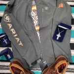 Ariat jacket with brown dress shoes and cross necklace